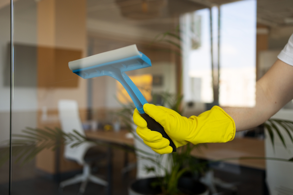A squeegee on a pane of glass